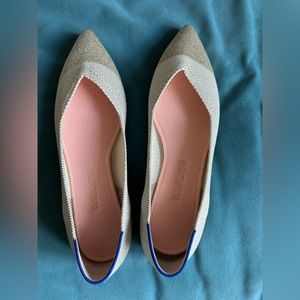 Rothy’s gold shimmer cap toe point